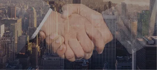 都市の風景と握手をしている写真